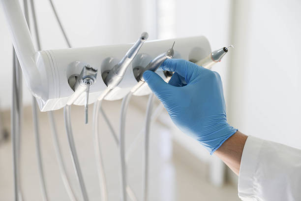 Professional Root Canal Treatment technician working in Mission Hills, KS